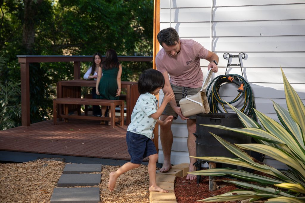 Declan Hearne composting with his son